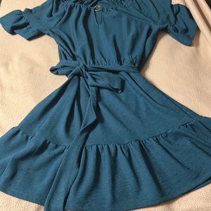 Michael Kor’s greenish blue dress